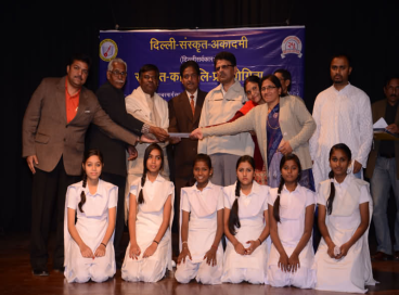 Students are performing in kavvali competition.